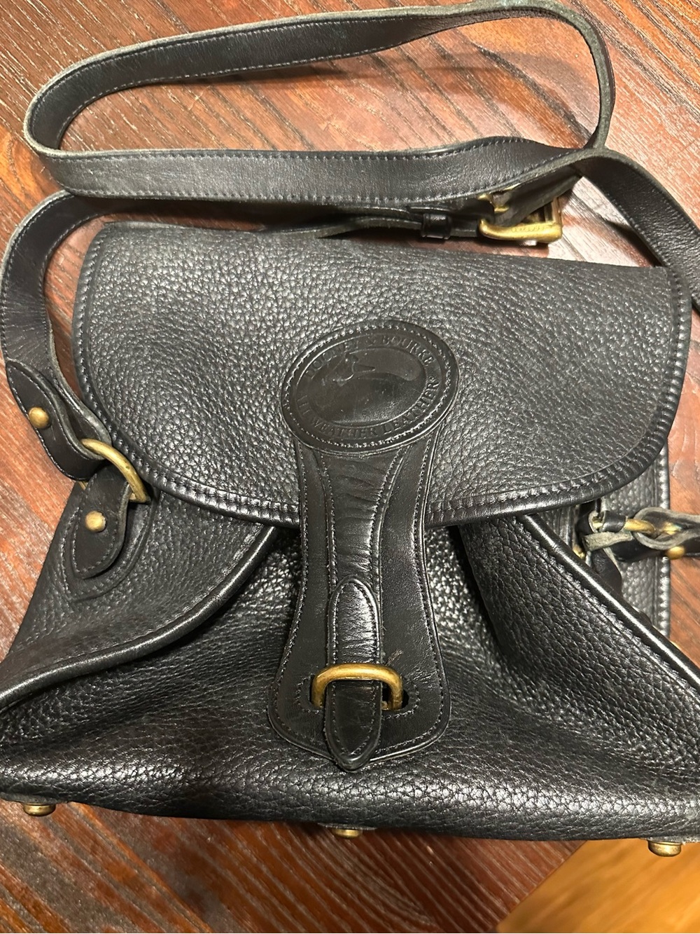 Vintage Dooney & Bourke Black Pebbled Leather Flap Crossbody with Brass Accents